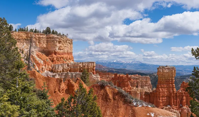 Hoodoos and distant snow-covered peaks from Agua Canyon Overlook, Bryce Canyon National Park, Utah