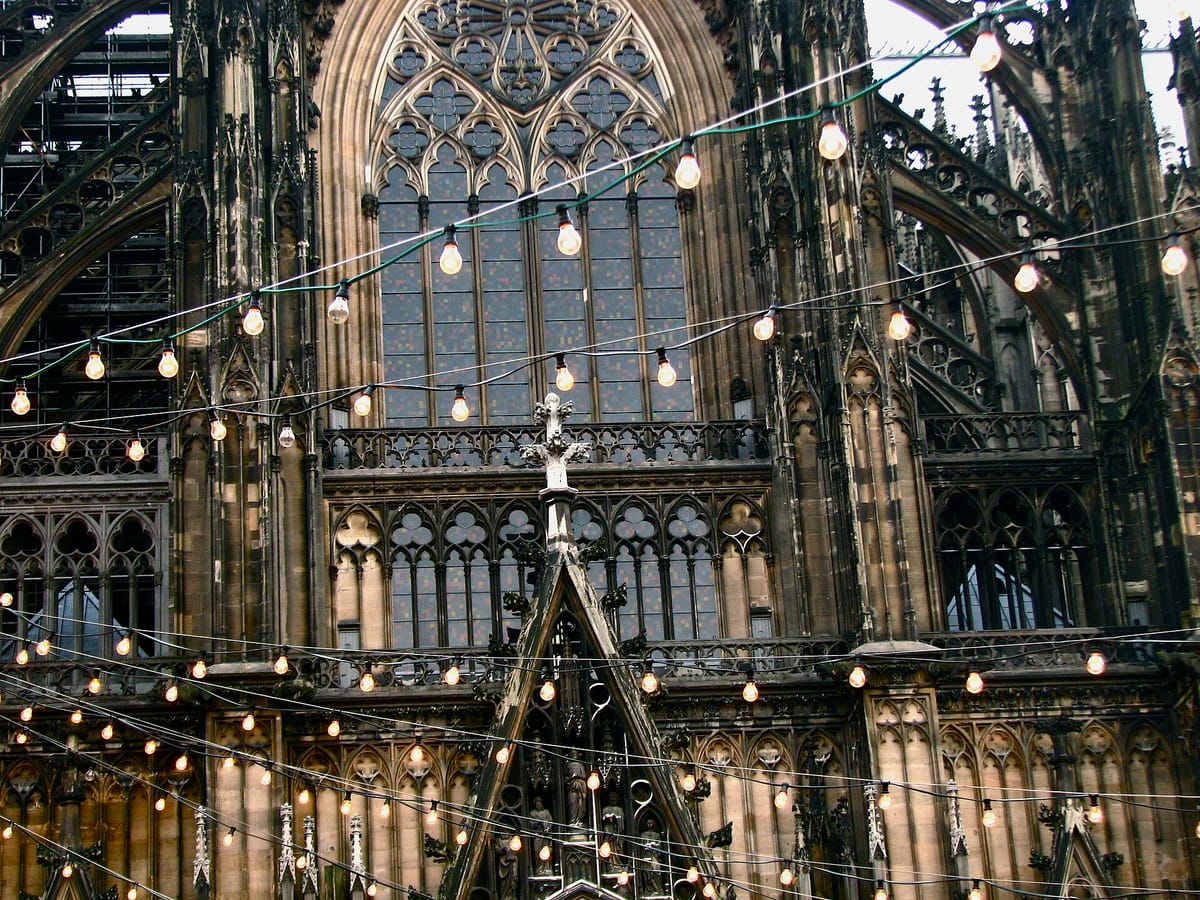 Christmas market stalls beside Cologne Cathedral